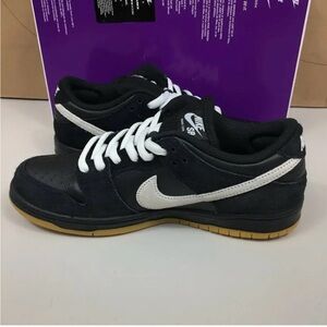 Nike SB Black Suede Low Sneakers with White Swoosh and Gum Sole